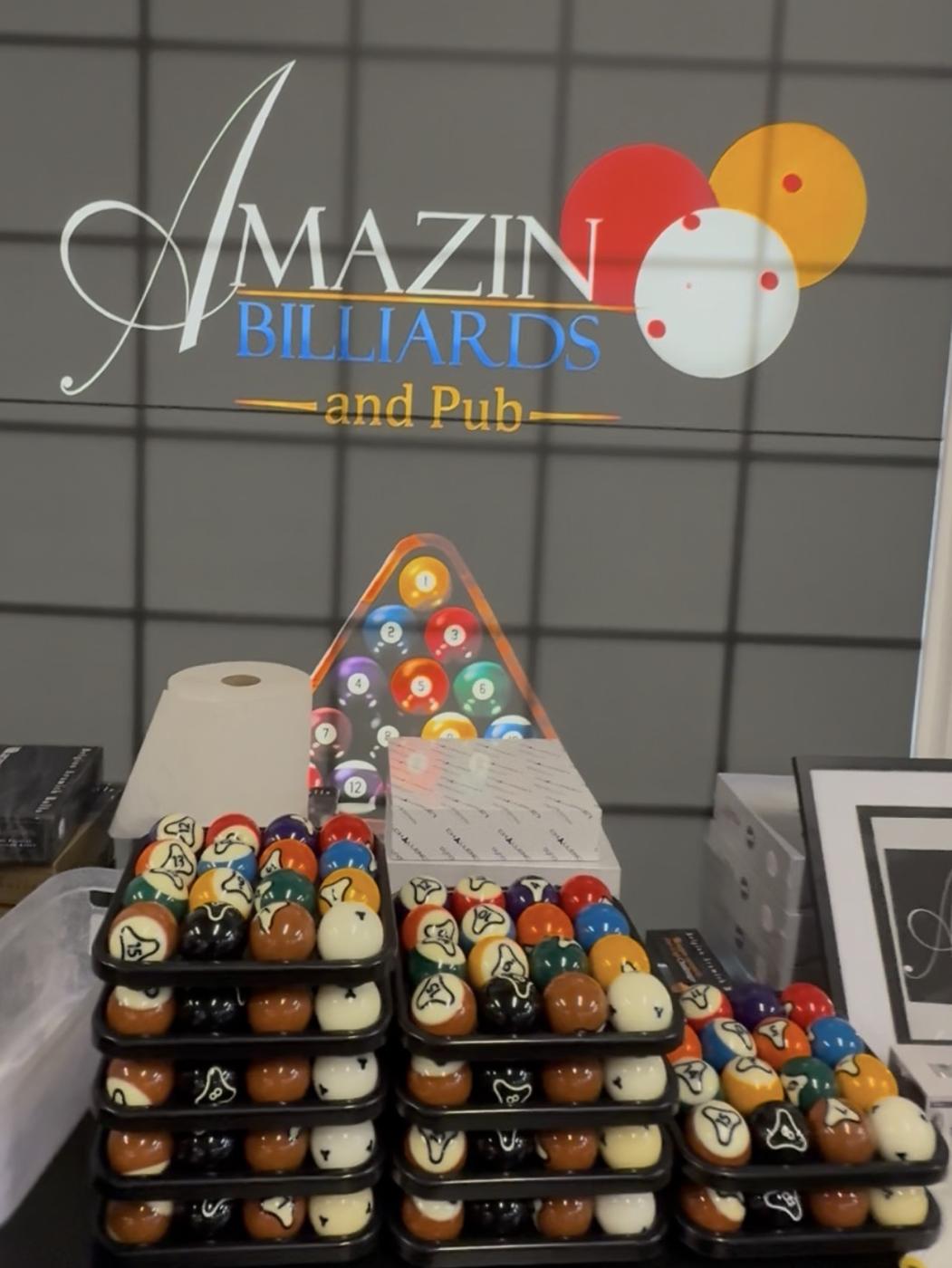 Dynaspheres ball sets stacked under the Amazin logo