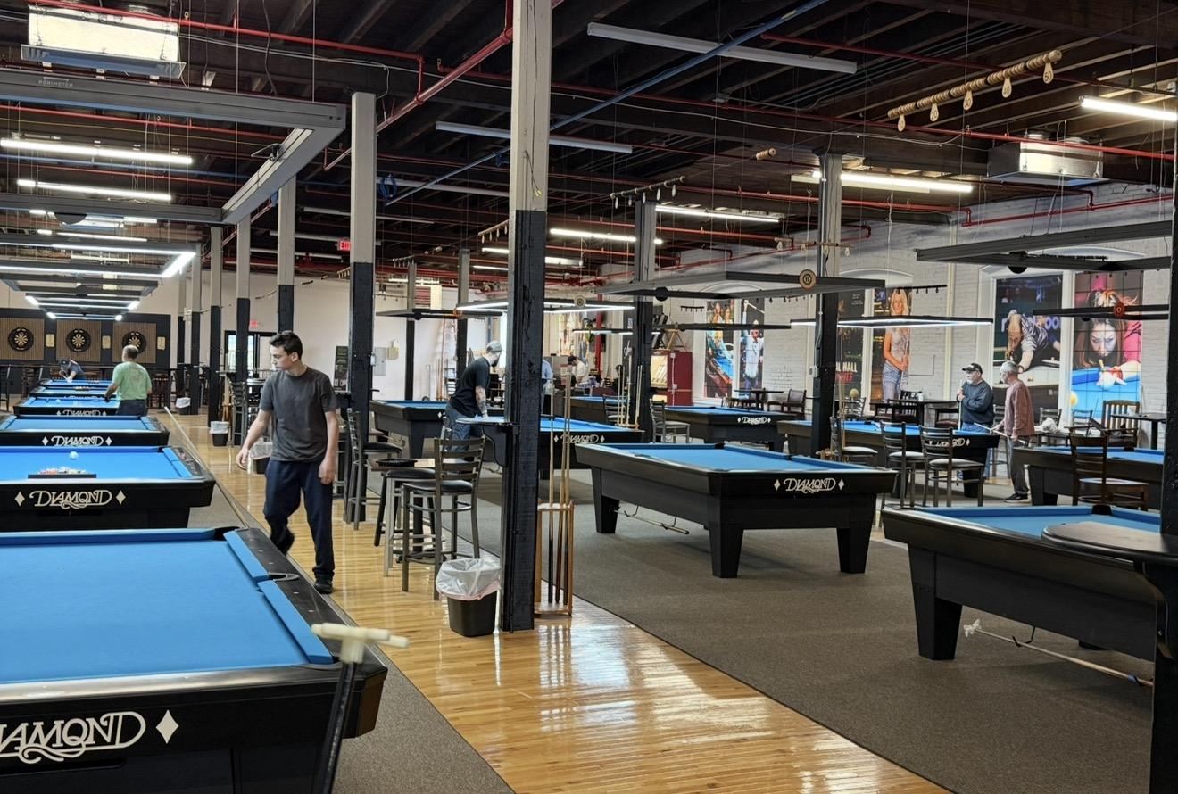 Players on Diamond tables during league night