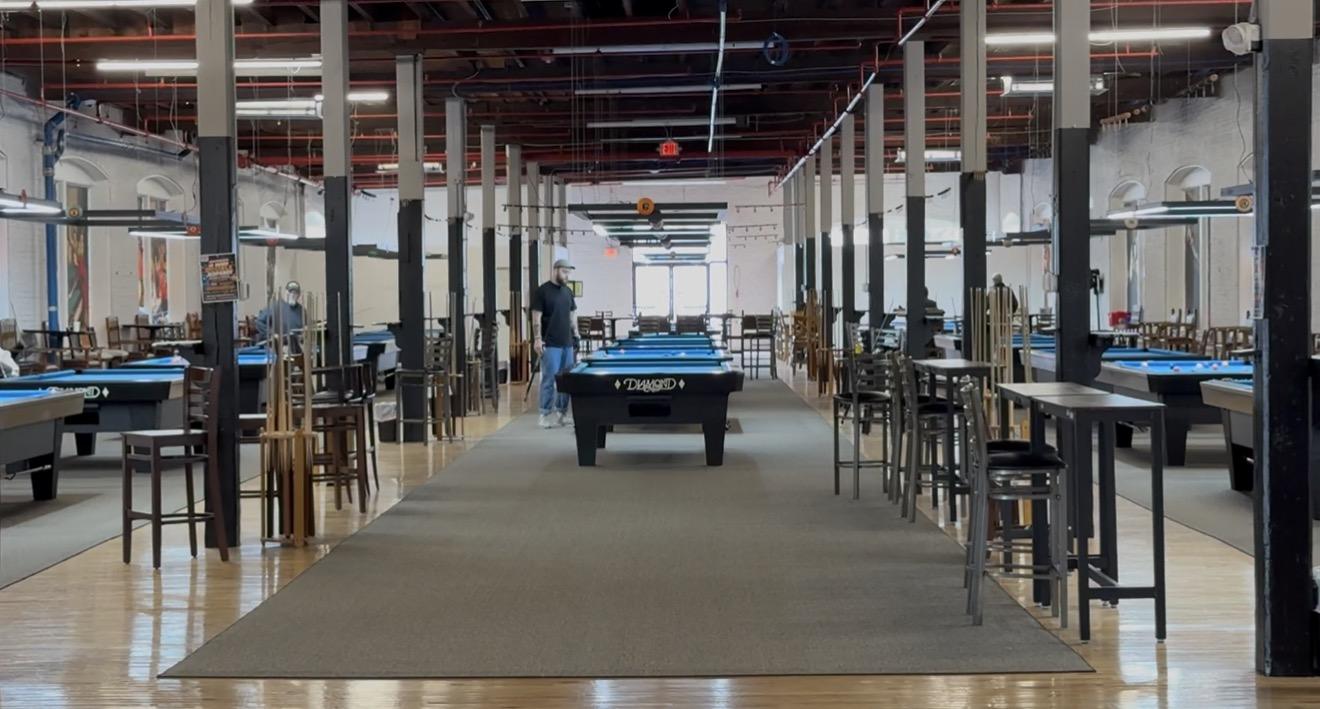 Center aisle of the pool room