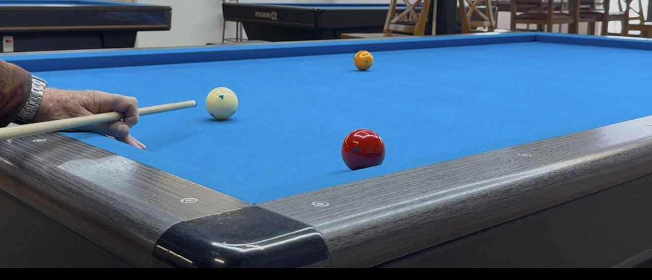 Shot on a carom table corner
